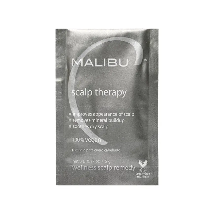 sachet of Malibu scalp wellness therapy crystals. these are included in the scalp wellness package at mango hair Design in Leeds